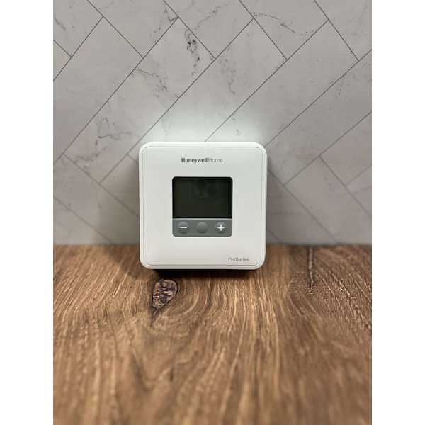 Resideo T1 Line Voltage Thermostat, Heat or Cool, Non-Programmable, 32 to 102 Degrees F, White TH1110D2009/ T1 PRO - main